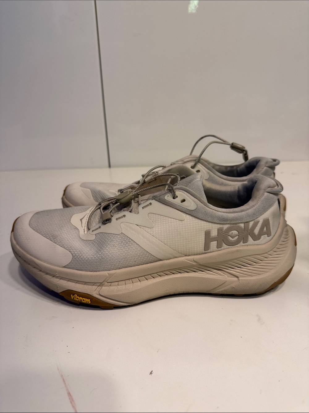 Gently used Hoka women’s Running Shoes in Light Gray Hoka Transport